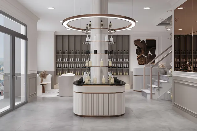 Interior of a modern beauty and cosmetics store with brightly lit display counters, tester units and product shelving
